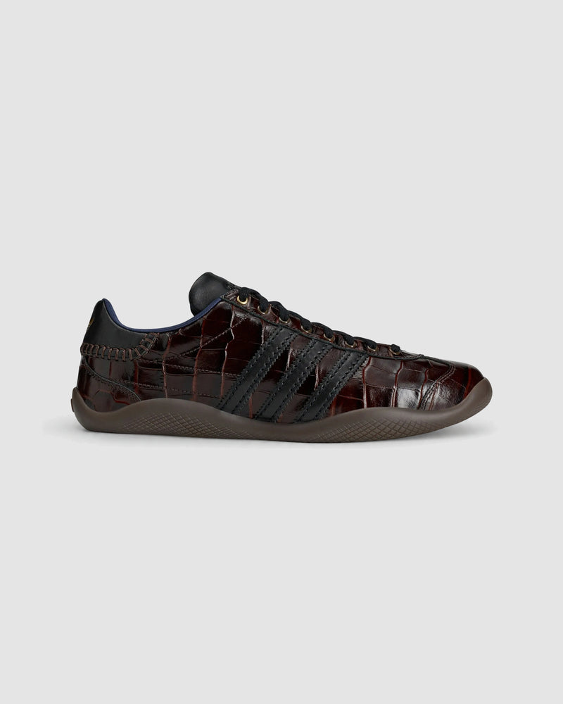 adidas Originals by Wales Bonner Karintha Croc — dark brown crocodile-embossed leather low-top with black Three Stripes and gold eyelets